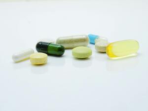 Pills on a table representing oral diabetes medications