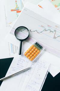 Calculator and papers to mimic calcualating correction factor